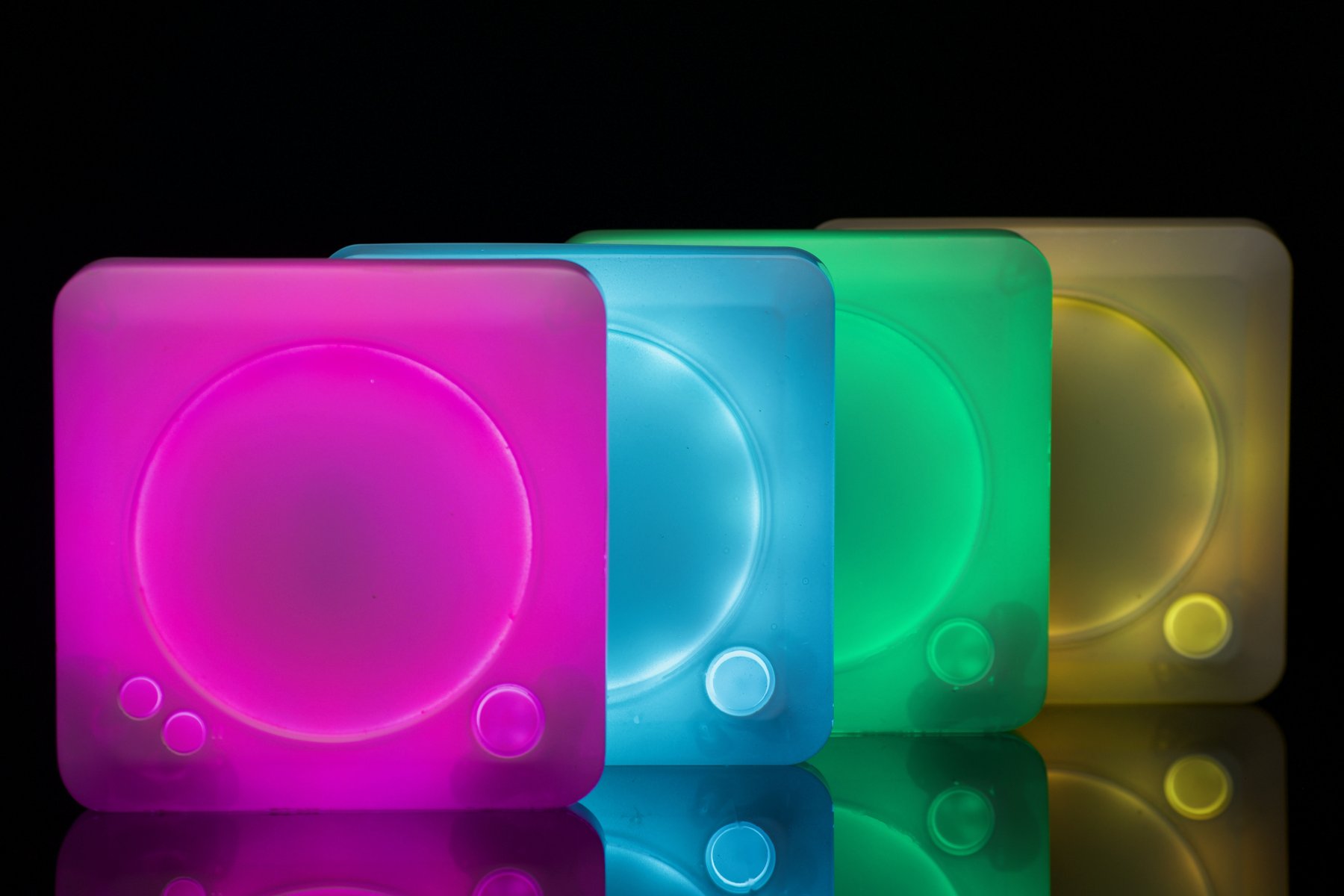 Four NexTurn coasters, all lit